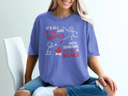 Purple t-shirt with text "IT'S ALL FUN AND GAMES UNTIL SOMEONE LOSES A WEINER."